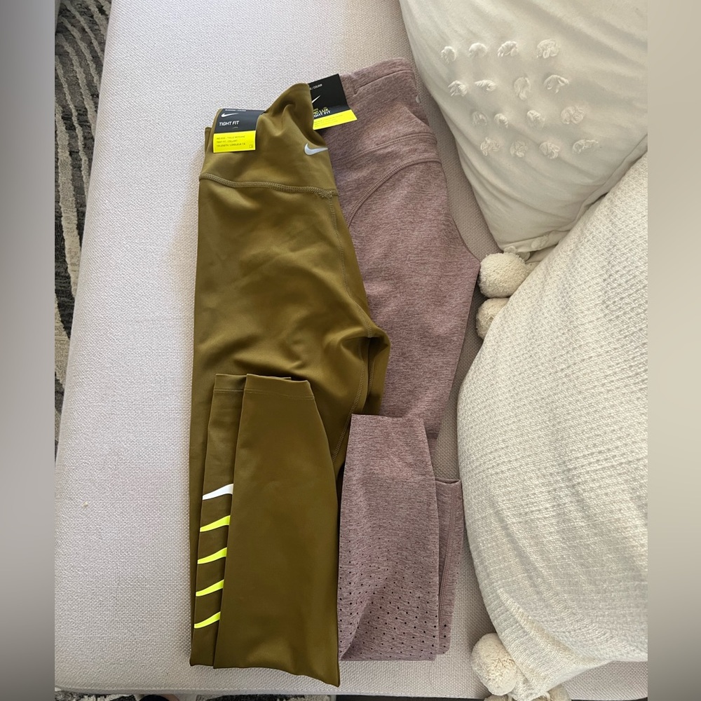 2 pairs of Nike running leggings
